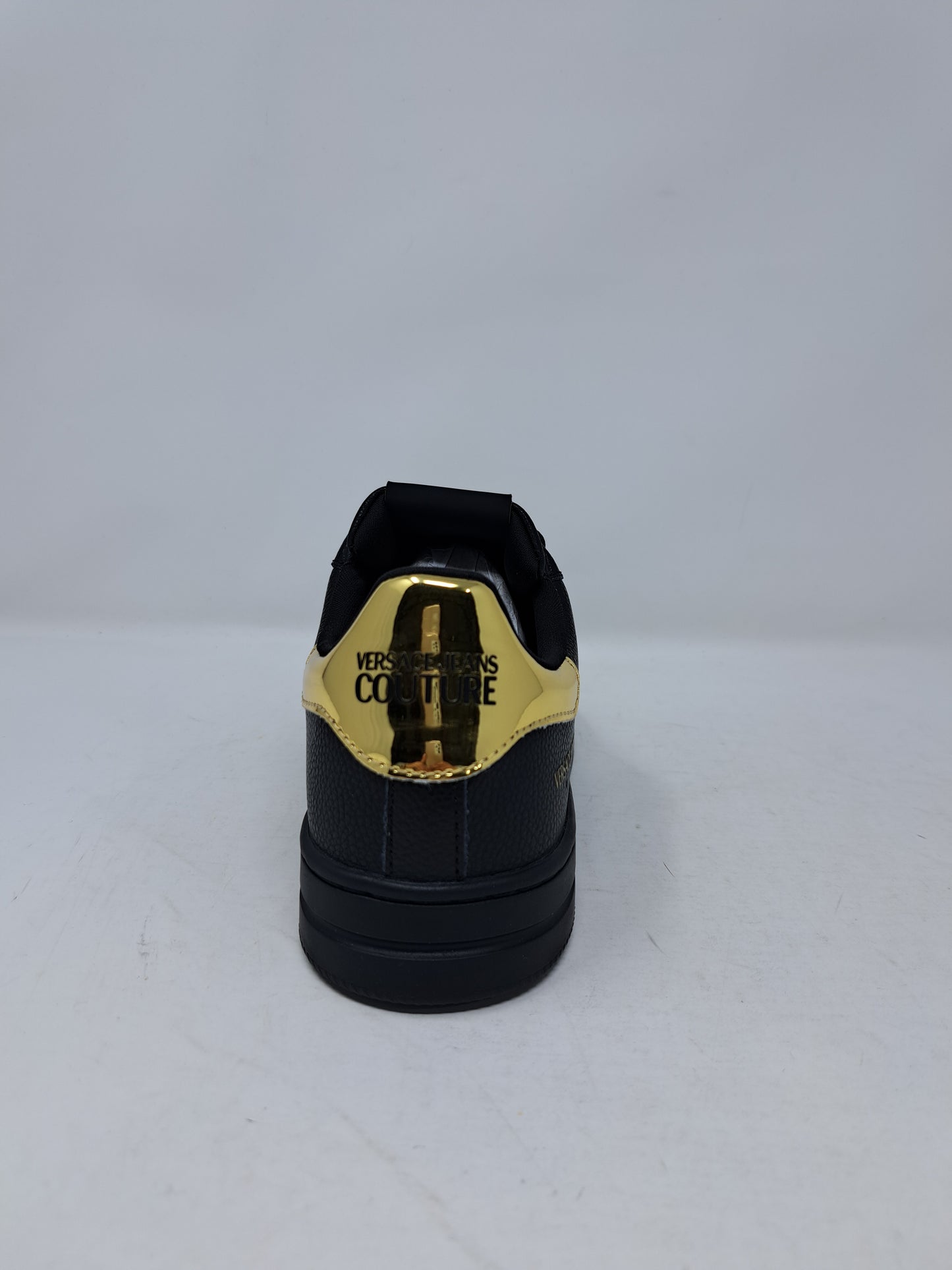 Sneakers Versace con applicazione logo