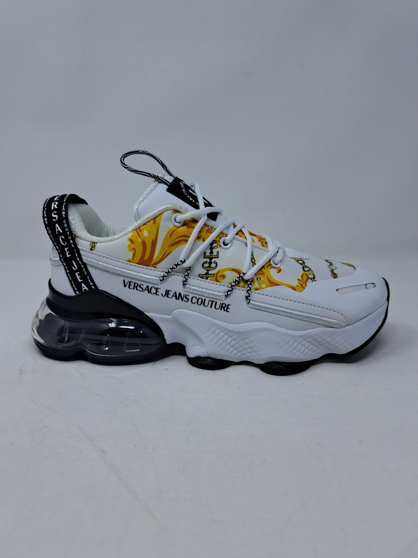 Versace Sneakers uomo con stampa Chain Couture