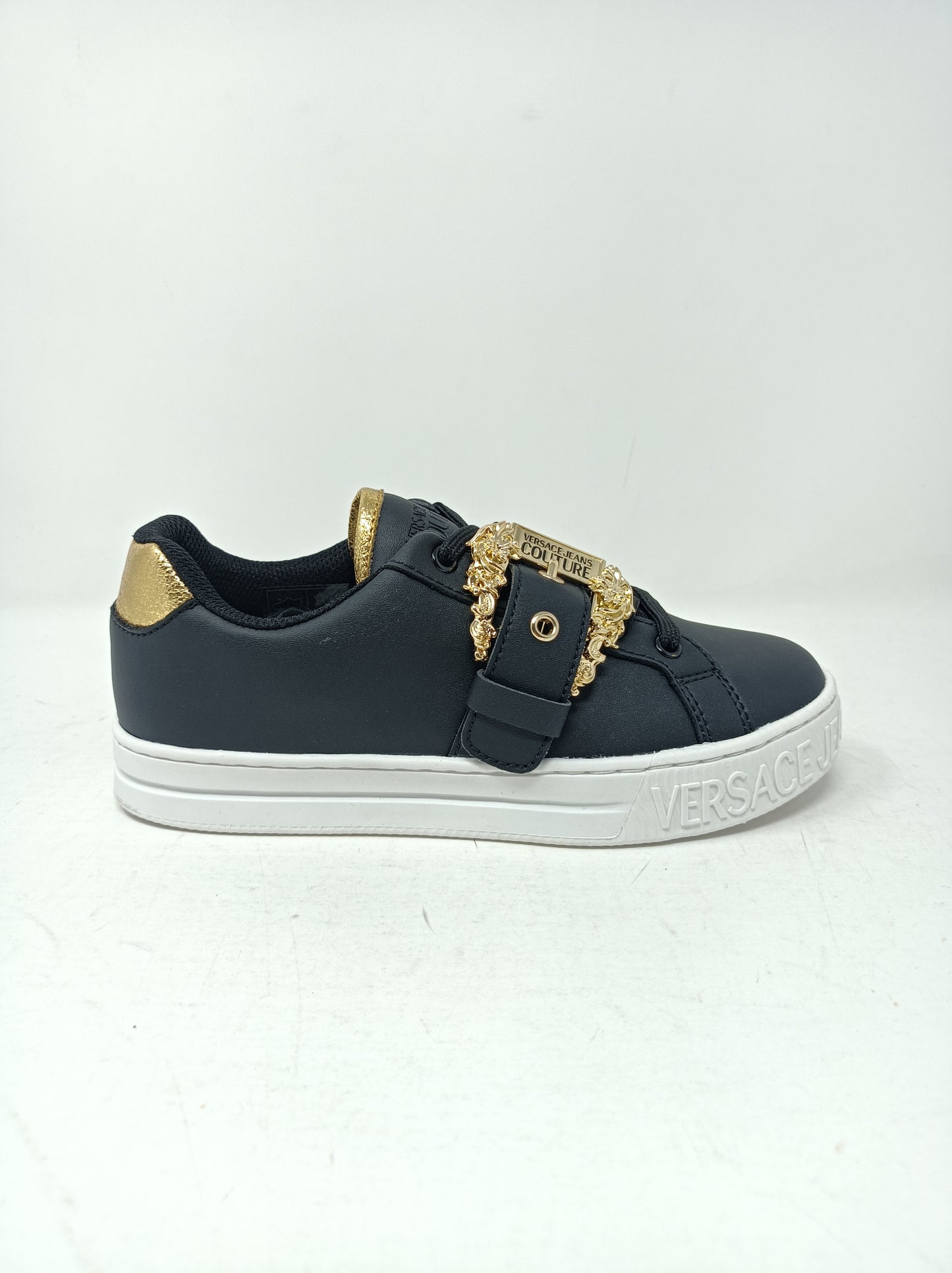 Sneakers con fibbia