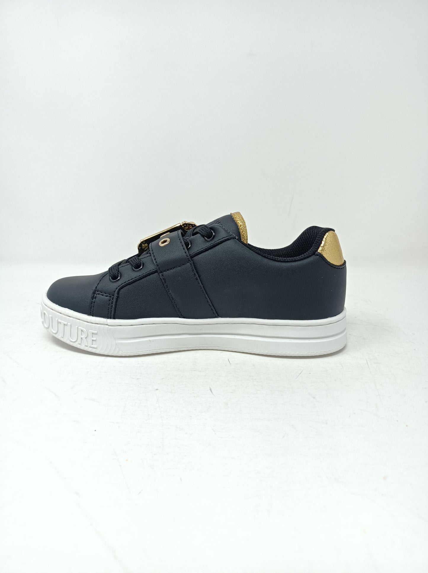 Sneakers con fibbia