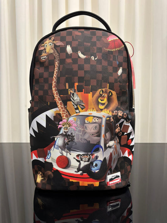 MADAGASCAR CHECKER SMASH DLXSV BACKPACK SPRAYGROUND