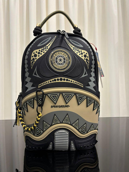 AI WONDERLAND GOLD AND BLACK BACKPACK SPRAYGROUND
