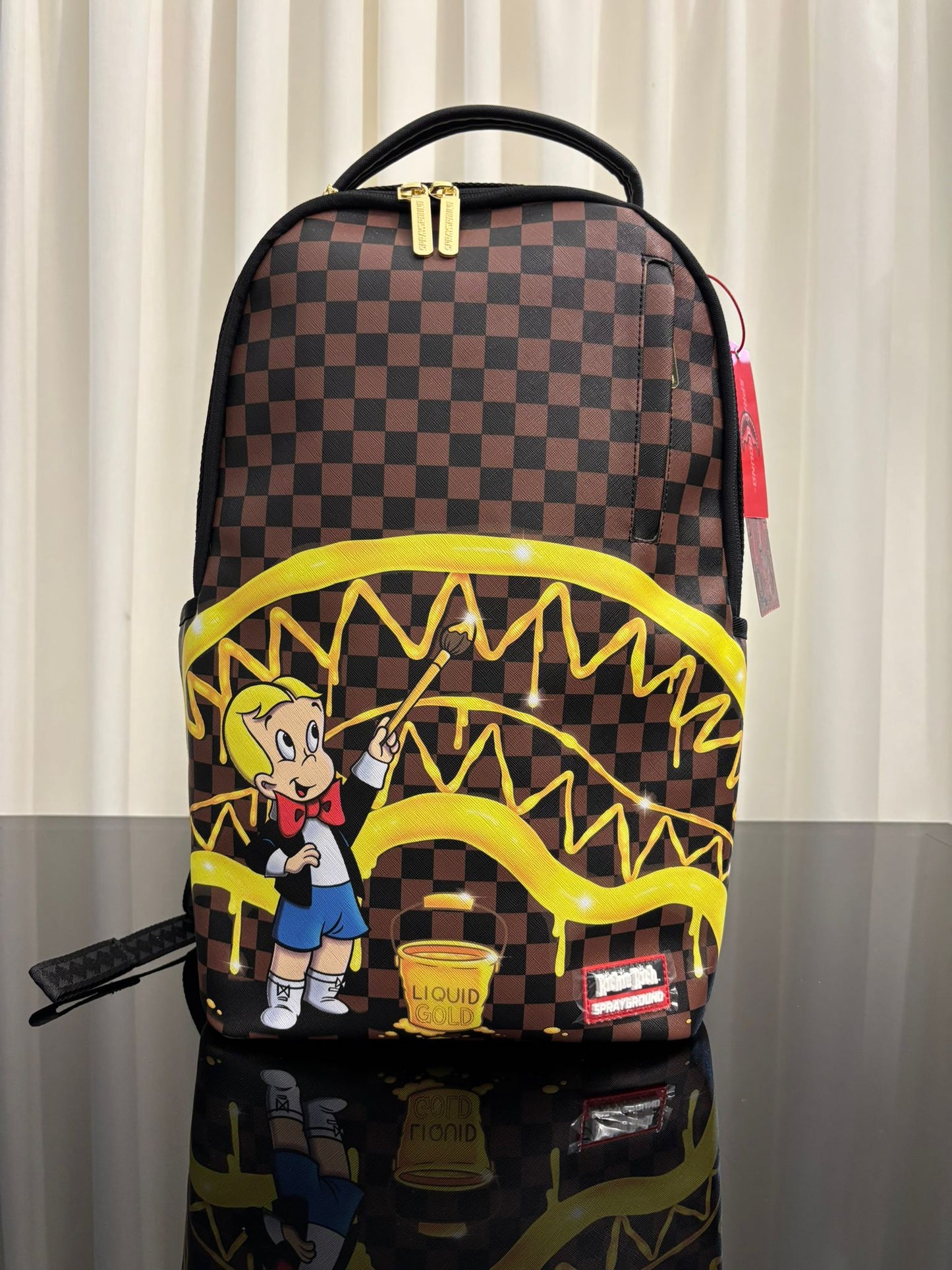 RICHIE RICH GOLD SHARKMOUTH DLXSV BACKPACK SPRAYGROUND