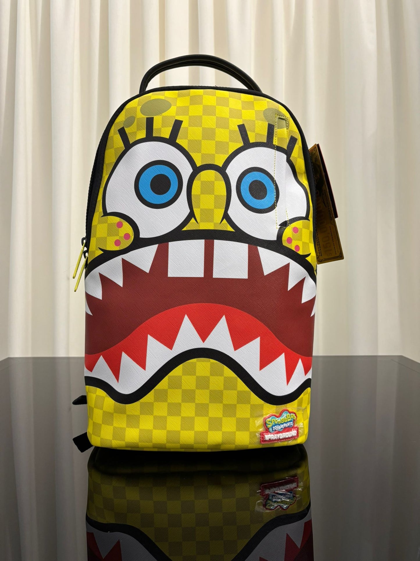 SPONGEBOB CHECKERBOB DLXSV BACKPACK SPRAYGROUND